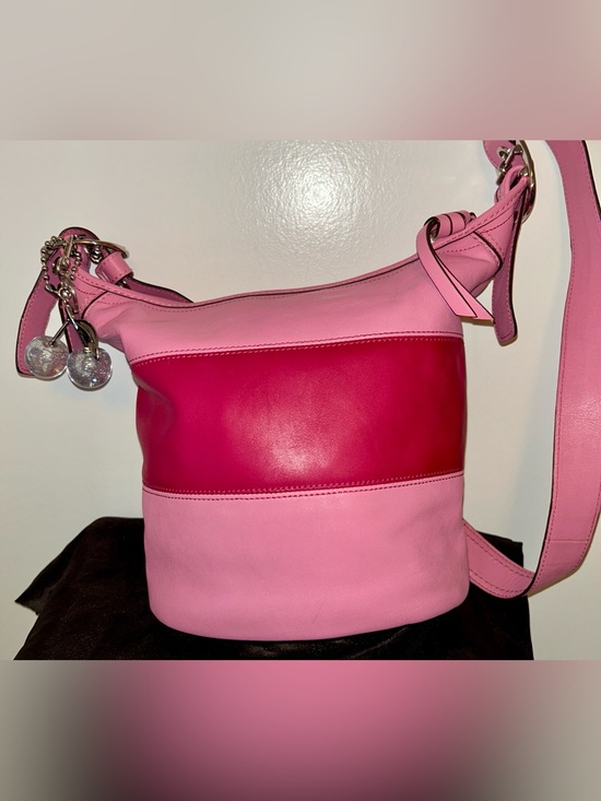 Coach Handbags - COACH Alternating Pink Leather Rugby
Stripes Bleeker duffle crossbody. RARE!